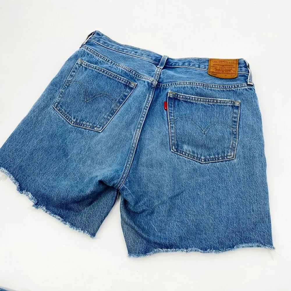 Levi's 501 denim raw hem distressed long shorts‎